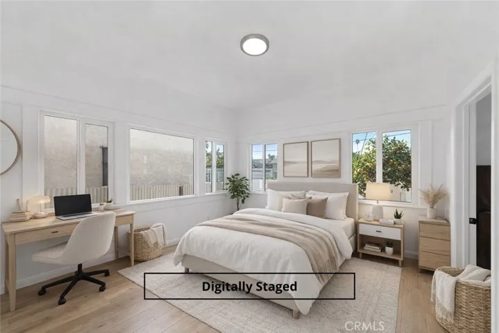 Digitally staged enclosed porch.