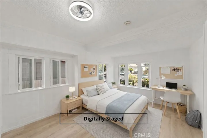 Front bedroom is a generous size & digitally staged.