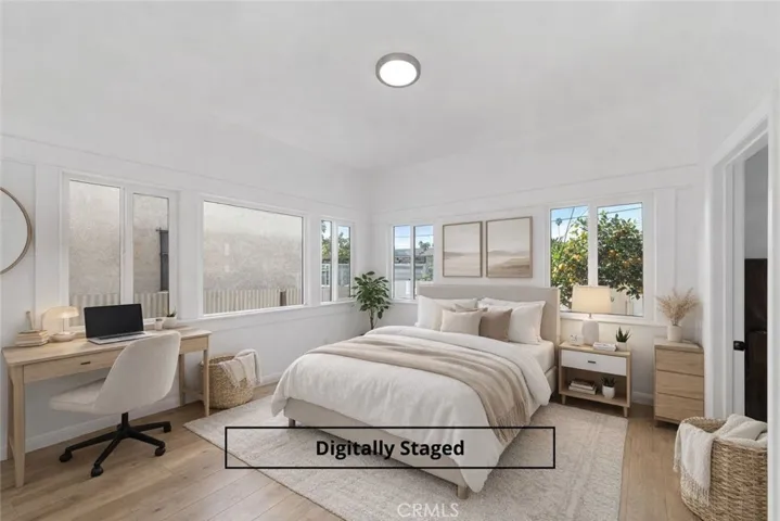 Digitally staged enclosed porch.