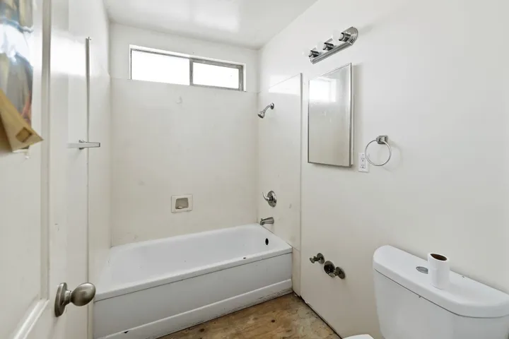 Full bath with shower / bath combination and toilet