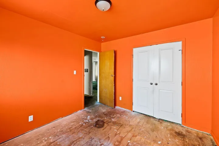 Unfurnished bedroom with a closet