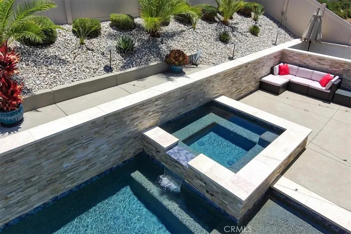 Aerial of jacuzzi and waterfall