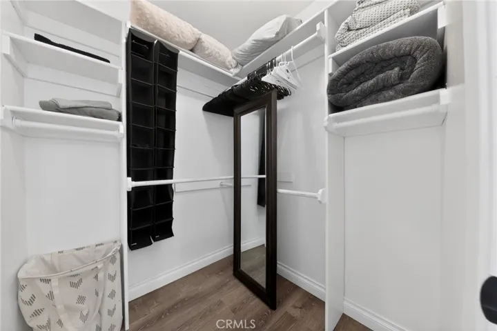 Walk-in closet  for second bedroom has lots of storage.