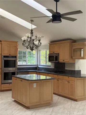 Many of the cabinets have pull out drawers