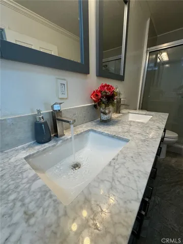 2 story - no neighbors above or below. Huge 1 bedroom, 1.5 bath with upgrades, Refrigerator, Washer/Dryer/Microwave included.  Attached fenced cover patio and balcony.  1 car garage and street parking.