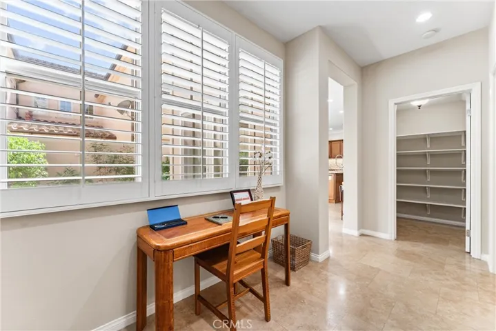 The hallway by the laundry can be used as a tech center.