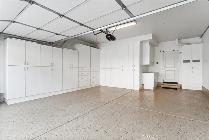 Epoxy flooring and custom cabinetry.