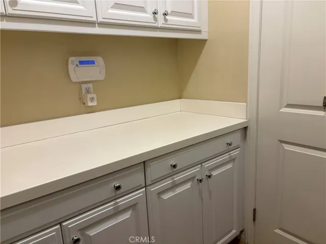 So many built-in cabinetry in the laundry room.