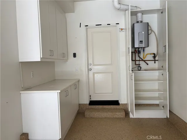 Tankless water heater and built-in showcase.