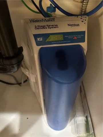 A reverse osmosis under the kitchen sink.