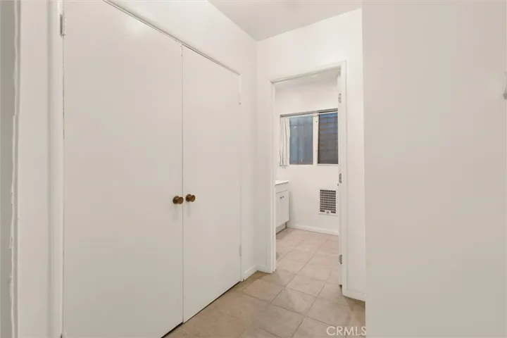 One Bedroom Unit Hallway with storage closet