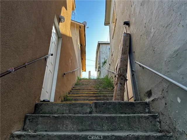 Stairs looking up from bottom of property