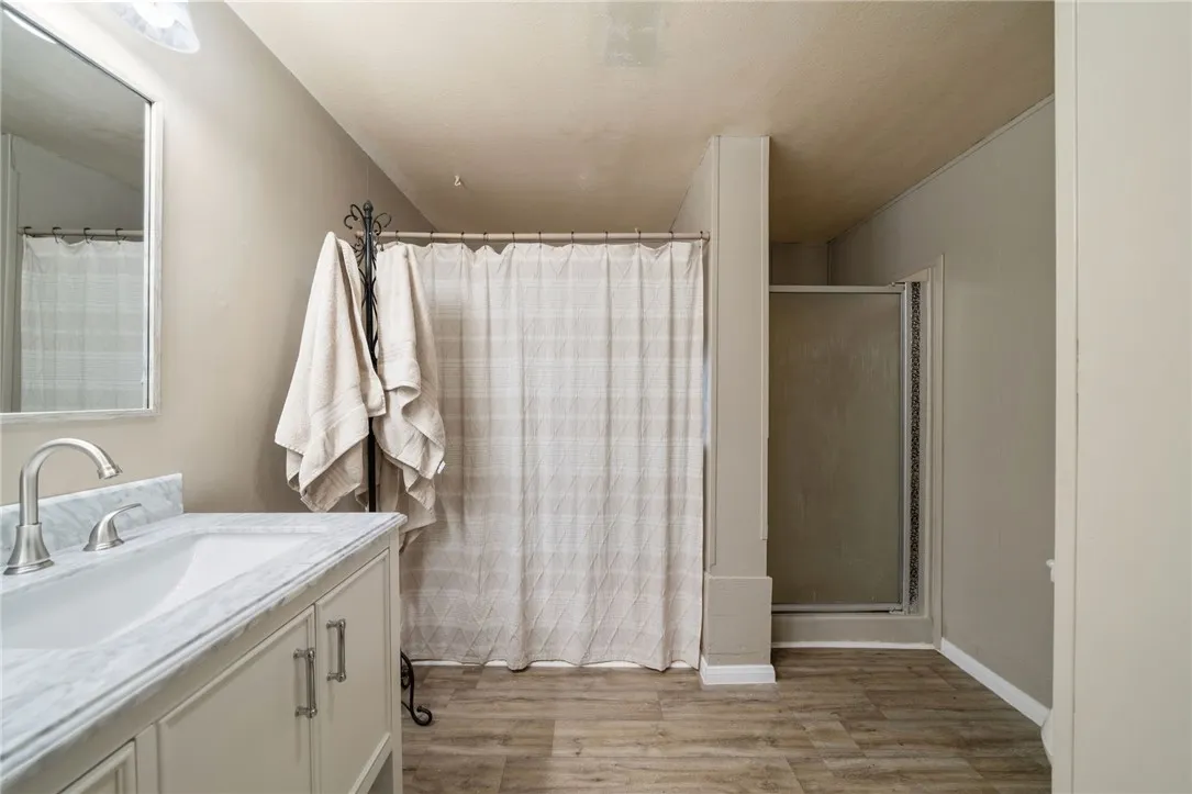 Primary bathroom with LVP flooring