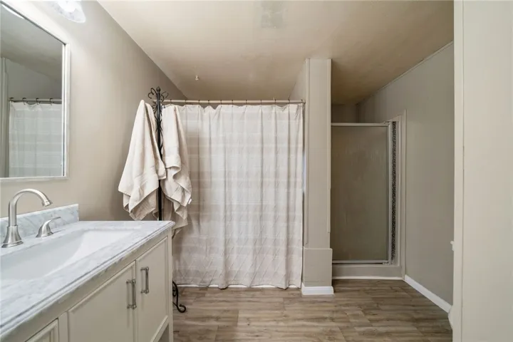 Primary bathroom with LVP flooring