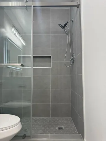 Tiled Shower with Glass Door