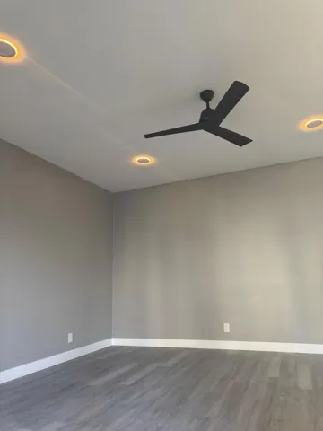 Bedroom fan and dimmed dimmed lightin