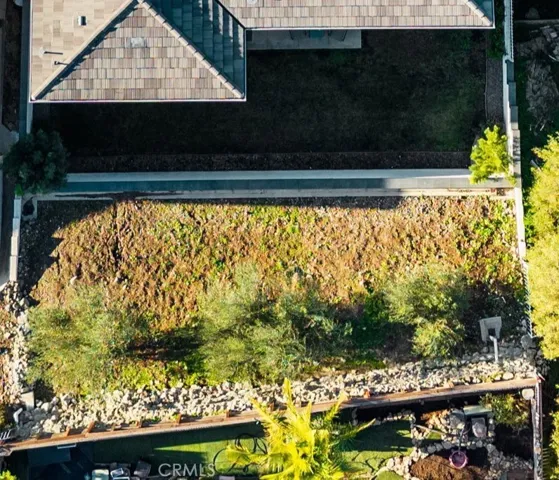 Actual aerial photo of back terrace and yard