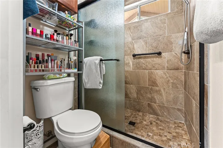 Primary Walk-in Shower Remodeled with Tile and New Glass Enclosure