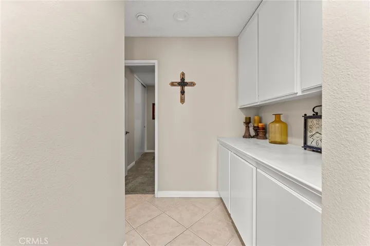 Hallway with Linen Cabinets