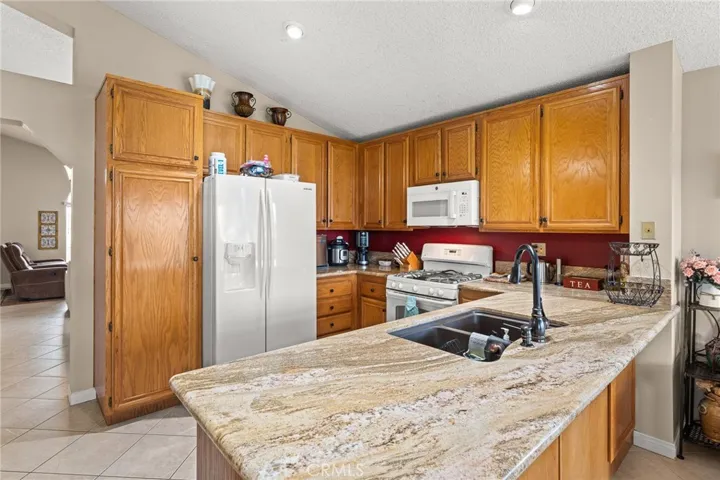 Kitchen with Granite Countertops and Breakfast Bar