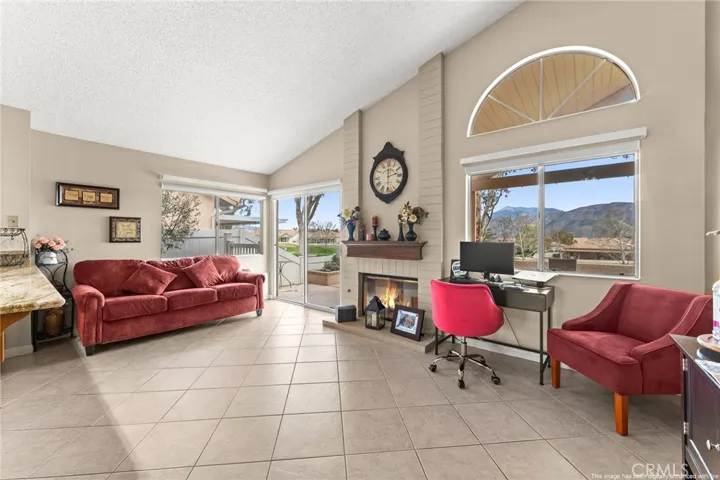 Family Room with Expansive Panoramic Views of Golf Course and Mountains