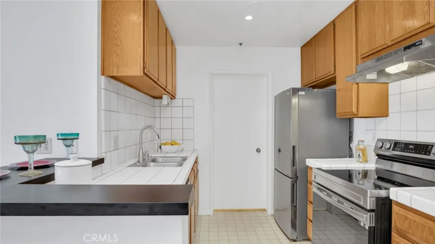 Kitchen leads to Laundry Room