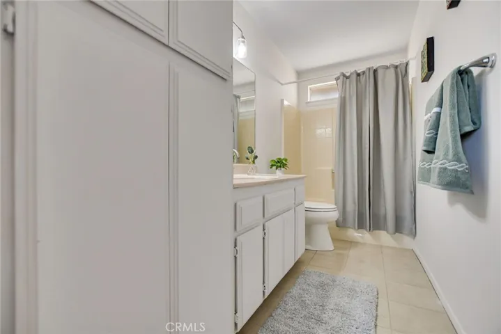 Bathroom with linen closet.