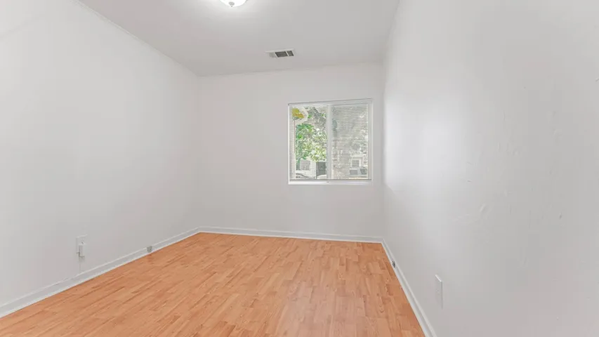Bedroom featuring light wood-type flooring