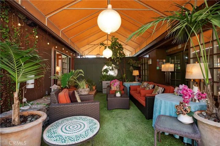 Covered patio accessed from primary bedroom