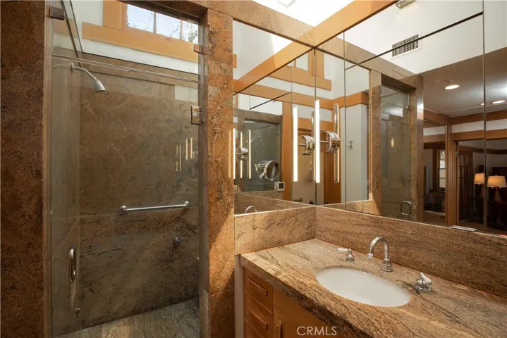Primary bathroom en suite with LARGE steam room shower