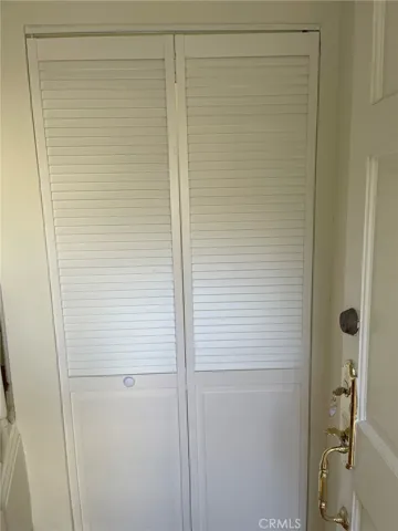 Folding door to close the washer and dryer area.