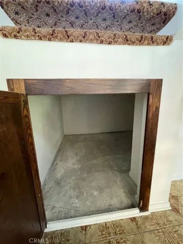 Small Storage area located underneath the staircase