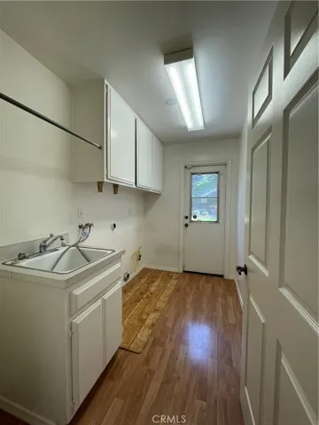 Laundry area with both water, gas, and electric access