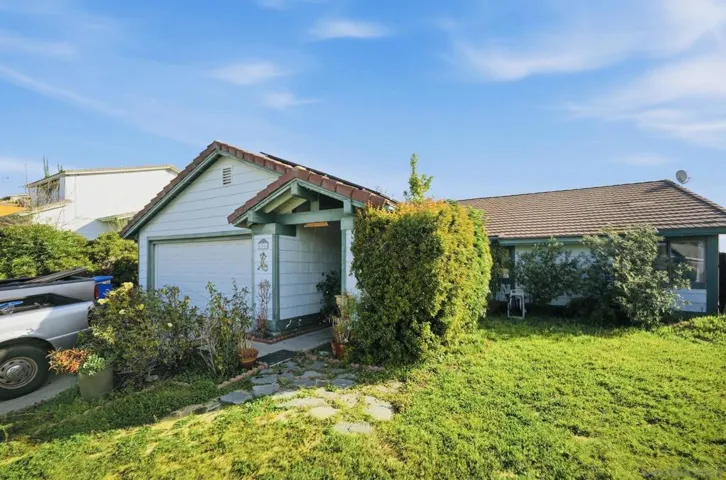 Specious front yard with covered entry