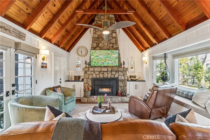 Stunning living room with refurbished fireplace and new insert