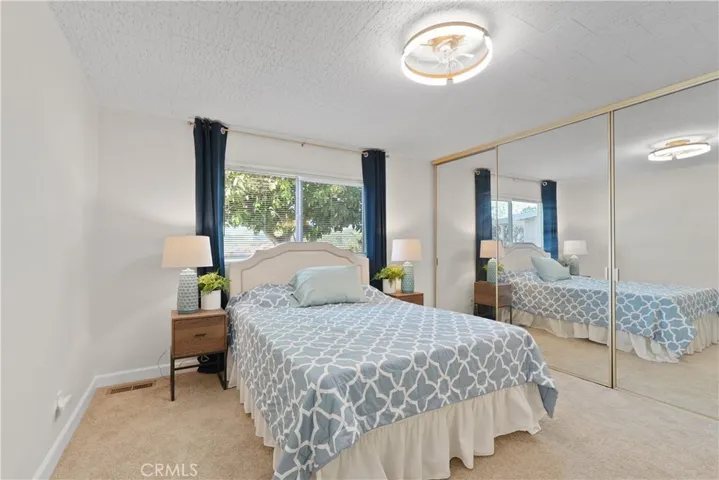 WALL OF MIRRORS, WINDOW GETS SUNSET VIEWS