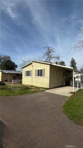 SIDE VIEW OF FRONT OF THE HOME