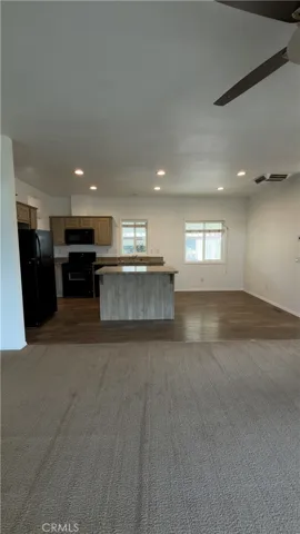 LIVING ROOM FACING DINING/KITCHEN