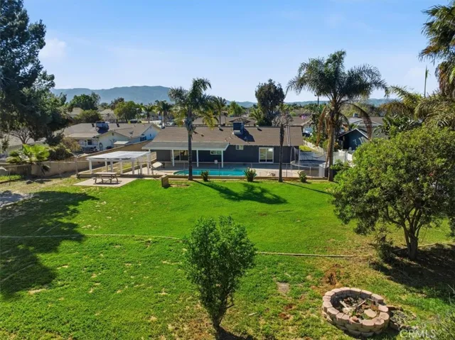 fire pit, spacious backyard
