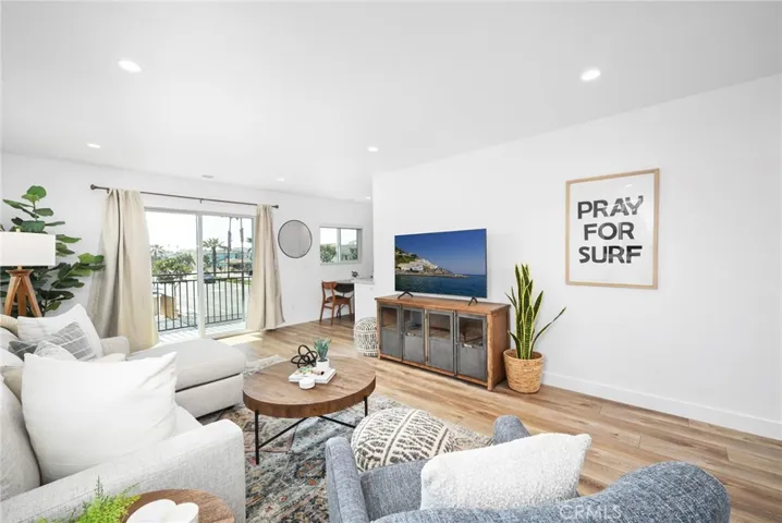 Upper Unit Living Room w/ Balcony