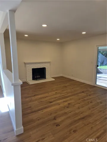 Living Room with fireplace and slider to back yard