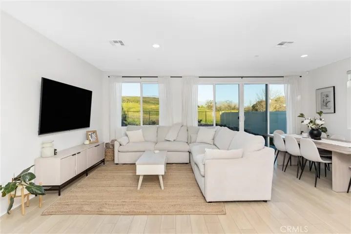 Family room with views of the golf course and mountains