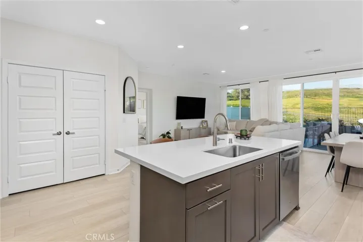 Kitchen island opens up to the family room