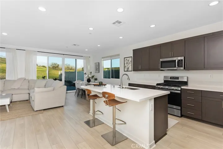 Open kitchen with quartz counter tops