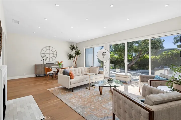 Spacious living area with abundant natural light and direct access to outdoor entertaining spaces.