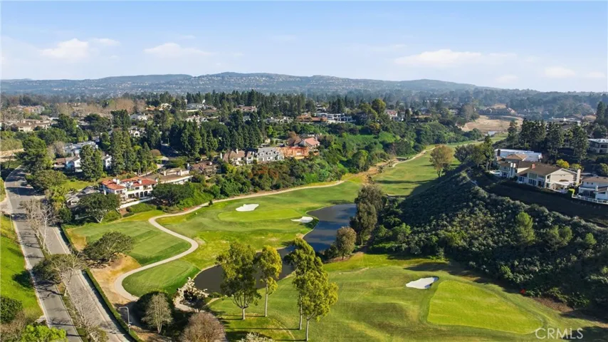Lush landscaping and sweeping course views showcase one of Newport Beach’s premier golf communities.