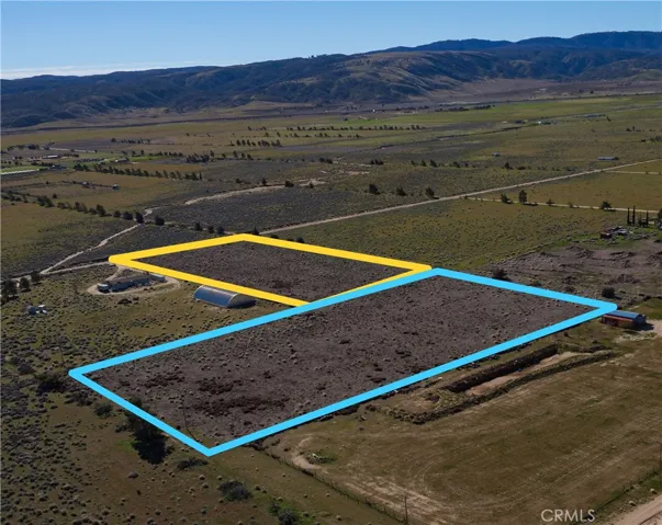 Yellow outline is current listing. Blue outline is adjacent property for sale