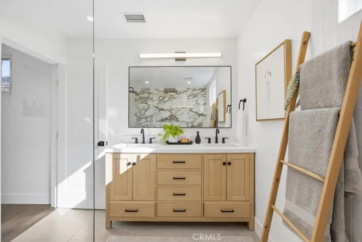 Primary bathroom with dual sinks, soaking tub and Toto bidet toilet