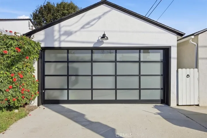 Garage off side street with updated door and lighting
