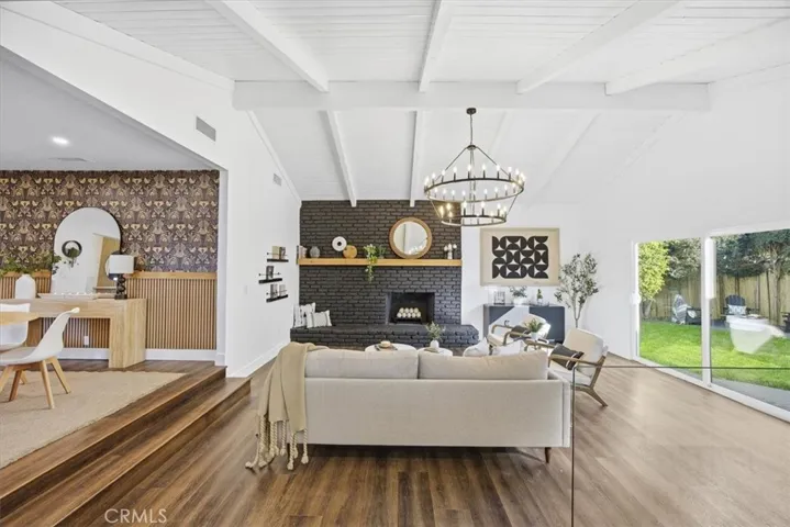 Open floor plan to kitchen and dining area